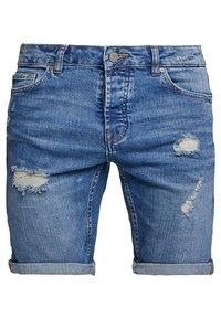 Farkkushortsit keskipitkässä sinisessä värissä, joissa on kulutettua tyyliä. Ominaisuudet: normaali malli, käännetyt lahkeet ja viisi taskua. Metallinen nappikiinnitys.