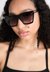 Tommy Jeans STRAPPY BADGE DRESS - Jersey dress - black