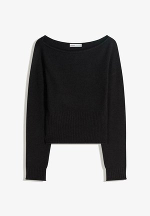 Musta neulepusero, jossa on paljas olkapää -kaula-aukko, pitkät hihat sekä resorit hihansuissa ja helmassa. Valmistettu pehmeästä, tekstuurillisesta materiaalista.