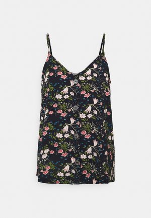 Top en cami floral, fond bleu marine avec des fleurs roses et blanches, bretelles réglables, design à col en V, présente un devant boutonné.