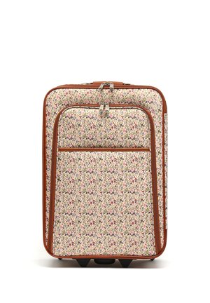 Valise souple avec motif floral en rose, violet et vert, garniture marron, deux poches zippées à l'avant, et roues à la base.