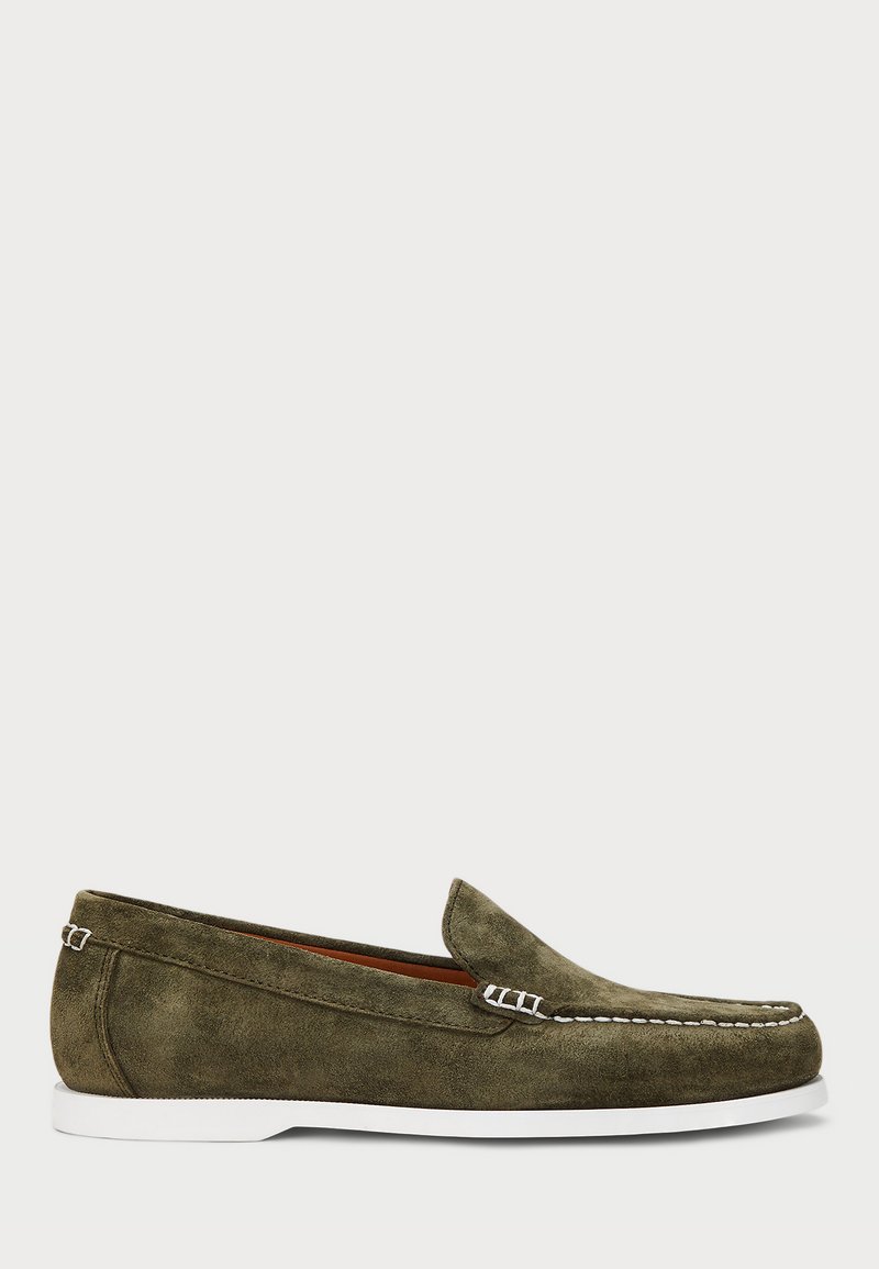 Green suede loafer with white rubber sole, almond-shaped toe, stitching details along the edge, and subtle metallic accents at the heel.