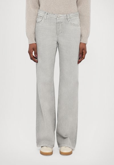 Lysegrå udsvingende jeans i denimstof med forlommer, bæltestropper og knaplukning. Glat tekstur med en afslappet pasform.