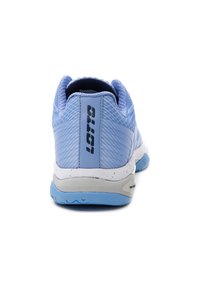 Light blue athletic shoes with a mesh upper, textured toe cap, padded collar, white midsole, and blue outsole. Black "lotto" logo on heel.