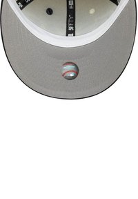 Gray baseball cap with a flat brim, featuring a round logo resembling a baseball on the underside, and interior black labels visible.