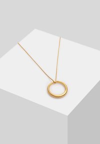 Guldfarvet vedhængs Halskæde med et glat, rundt design på en tynd, delikat kæde. Vedhænget har en poleret overflade og et minimalistisk udtryk.
