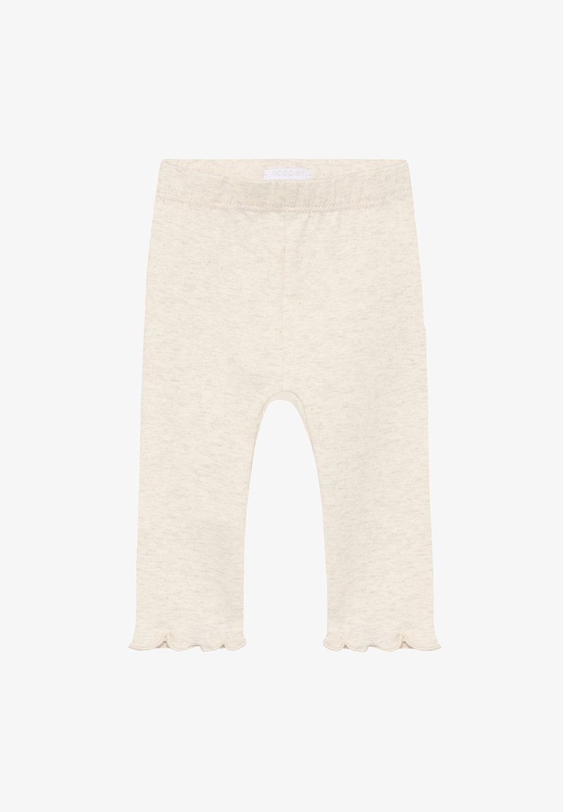 Leggings couleur crème en tissu doux, avec un ourlet festonné, une ceinture élastique, et une apparence simple et sans coutures.