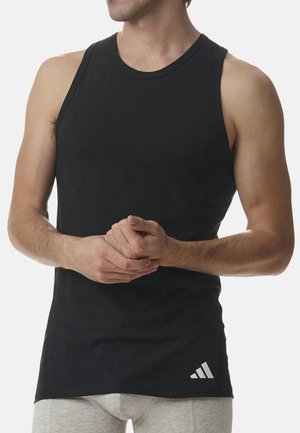 Schwarzes Tanktop aus Baumwolle mit Rundhalsausschnitt, ärmellosem Design und einem weißen Adidas-Logo unten rechts.