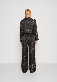 AllSaints SOFI SCREEN TROUSER - Nadrágok - black