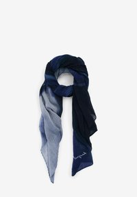 Mørkeblå og grå tørklæde med ribbet tekstur, der har subtile glimt og broderet "beyond"-detalje langs kanten.