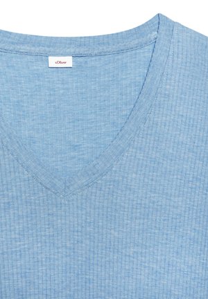 Light blue ribbed V-neck shirt with visible stitching and small white clothing label with red text at the back inside neckline.