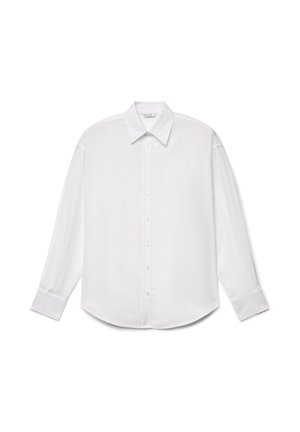 Chemise blanche à manches longues avec col pointu et poignets boutonnés, présentée à plat sur un fond blanc.