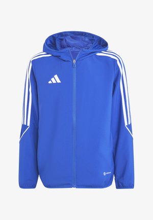Giacca sportiva blu con zip anteriore, cappuccio e design a tre strisce bianche sulle spalle. Tessuto morbido e polsini elasticizzati. Logo sul petto.