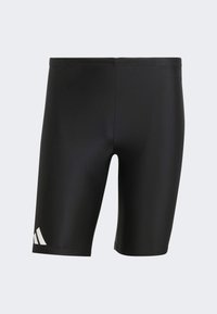 Shorts de bain noirs en tissu lisse, avec une coupe ajustée et une taille élastique, ornés d'accents de logo blanc sur le bas à gauche.