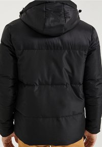 Black puffer jacket with a hood, featuring a quilted pattern and adjustable drawstrings. Smooth texture and mid-length design.