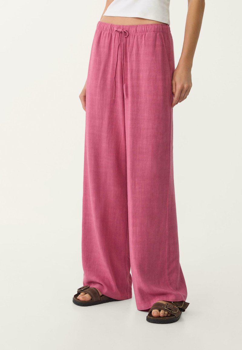 Stradivarius - FLOWING RUSTIC - Stoffhose - pink, Vergrößern