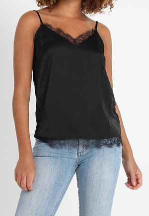 Camisole en satin noir avec bretelles réglables, ornée d'une dentelle le long de l'encolure et de l'ourlet inférieur. Texture lisse, coupe décontractée.