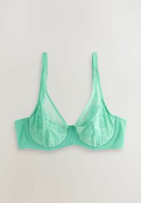 Svetlozelená čipkovaná podprsenka s nastaviteľnými ramienkami a kostícami, položená na neutrálnej podkladovej ploche.