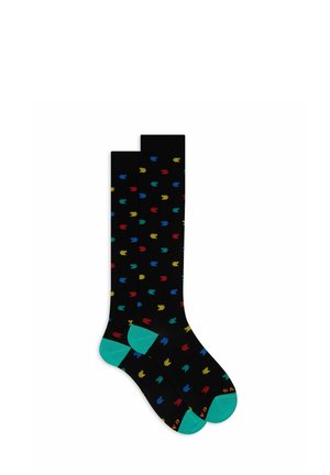 Calzini neri con piccoli motivi a foglia colorati in rosso, giallo, verde e blu. Accentuati da talloni e punte turchesi.