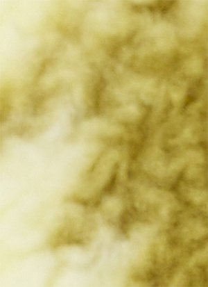 Sløret abstrakt tekstur med gule og beige toner, der ligner en blød, skyet eller uskarp overflade.