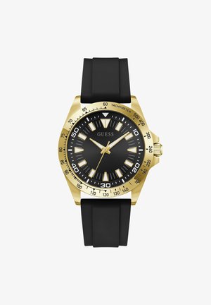 Ρολόι χειρός σε χρυσαφένιο τόνο με μαύρο καντράν, λευκούς και χρυσαφένιους δείκτες ώρας, μαύρο λουράκι σιλικόνης και κλίμακα ταχυμέτρου στη στεφάνη.