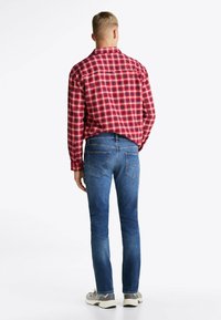 Tommy Jeans SCANTON FADED - Slim fit jeans - denim dark