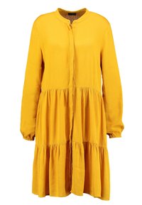 Gelbes Knopfkleid mit langen Ärmeln, gestuften Saum und weicher Textur. Verfügt über einen runden Ausschnitt und geraffte Manschetten.