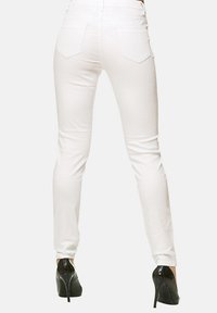 Elara STRETCH - Vaqueros pitillo - weiss
