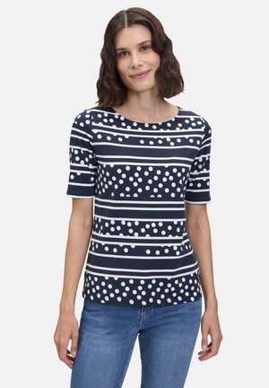 Navy-blue top with white horizontal stripes and polka dots. Short sleeves, round neckline, and a smooth fabric texture.