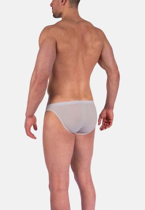 Grå herreboksershorts med subtil ribbet tekstur og en ensfarvet talje, set fra bagen, der viser et tætsiddende design og minimal dækning.