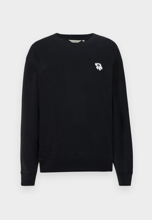 Black sweatshirt made of cotton. Features long sleeves, a round neckline, and a small white floral embroidery on the left chest.