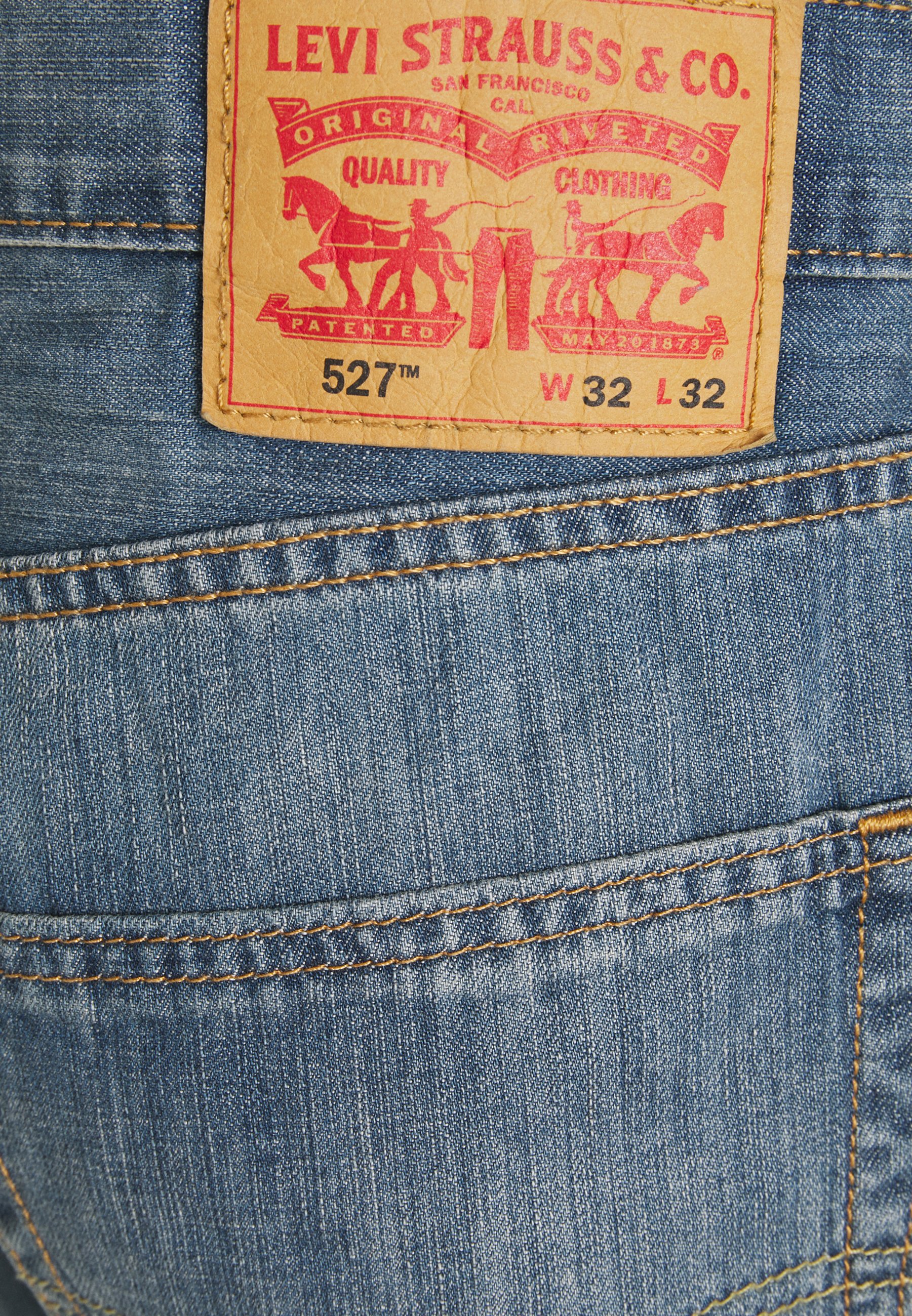 levis 527 medium chipped