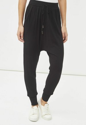 SAROUEL DE CON CINTURA ELÁSTICA Y LAZO - Pantalones - black