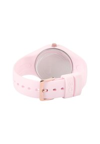Montre en silicone rose avec un fond de boîtier transparent, un matériel en rose doré, un bracelet ajustable avec boucle et plusieurs trous pour le réglage.