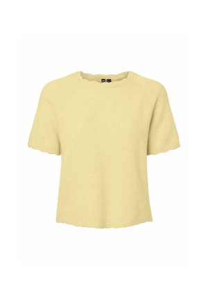 Haut en maille jaune clair à manches courtes avec bords festonnés aux manches, à l'ourlet et à l'encolure, présenté sur un fond blanc.