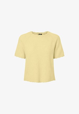 Lys gul kortermet strikket topp med bølgete kanter på ermer, nederkant og hals, vist på hvit bakgrunn.