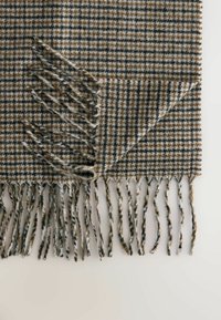 Woven scarf with a houndstooth pattern in browns and blacks, featuring fringed edges for texture and detail. Soft, warm material.