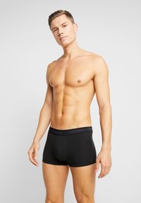 Calvin Klein Underwear LOW RISE TRUNK STRETCH 3 PACK - Cuecas boxer - black