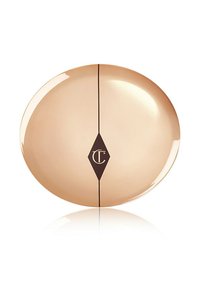 Rose gold circular compact with a glossy finish, featuring a black diamond logo element and a thin black line down the center.