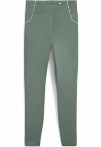 Leggings verdi realizzati in un tessuto morbido ed elastico con una vita alta. Presentano cuciture bianche a contrasto e due tasche laterali.