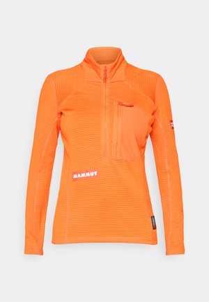 Oranžs garā piedurkne krekls ar ceturtās daļas rāvējslēdzēju, teksturēta auduma, kontrastējošas šuves, priekšējā kabata un "MAMMUT" logotips apakšējā kreisajā pusē.