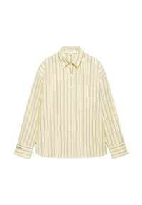 Chemise boutonnée jaune clair avec fines rayures verticales marron, manches longues, col, poche poitrine et petit texte sur le poignet gauche.