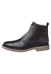 Dunkelblaue Leder-Stiefelette mit runder Zehenform, beigen Schnürsenkeln und grauer Gummisohle. Verfügt über dekorative Steppnähte und eine Schlaufe an der Ferse.