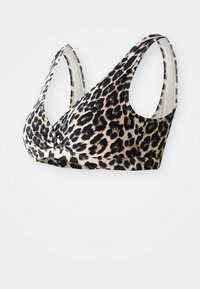 Pöttyös bralette, puha anyagból készült, széles pántokkal, V-nyakkivágással és varrás nélküli kialakítással a kényelem érdekében.