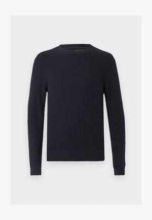 Mornarska rebrasta pletena pletiva sa okruglim izrezom, dugim rukavima i teksturiranim završetkom, sa prilagođenim donjim rubom i manžetama.