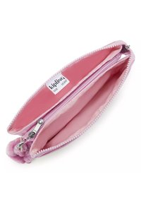 Pochette rosa con zip, dotata di doppi scomparti, morbida esterno, fodera interna e dettagli con pompon. Etichetta del marchio visibile all'interno.