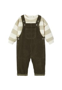 Green corduroy overalls with a front pocket, paired with a beige and olive striped long-sleeve shirt. Features button closures and rolled cuffs.