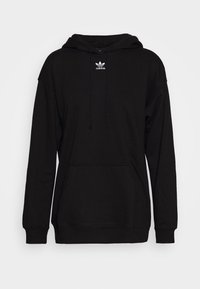 Černá mikina s kapucí vyrobená z měkké látky. Obsahuje klokaní kapsu, žebrované manžety a malou bílou logo Adidas na hrudi.