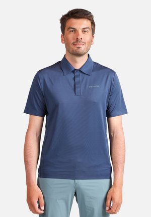 Polo shirt in navy blue, made of smooth fabric, featuring a collar, short sleeves, and a subtle logo on the left chest.