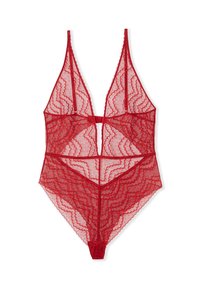 Body en dentelle rouge avec un décolleté plongeant, un motif festonné et de fines bretelles. Comprend des sections découpées et un dos string.